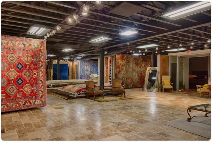 Rug Expo store showcasing a variety of antique rugs in San Diego